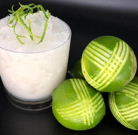photo of coconut with limes